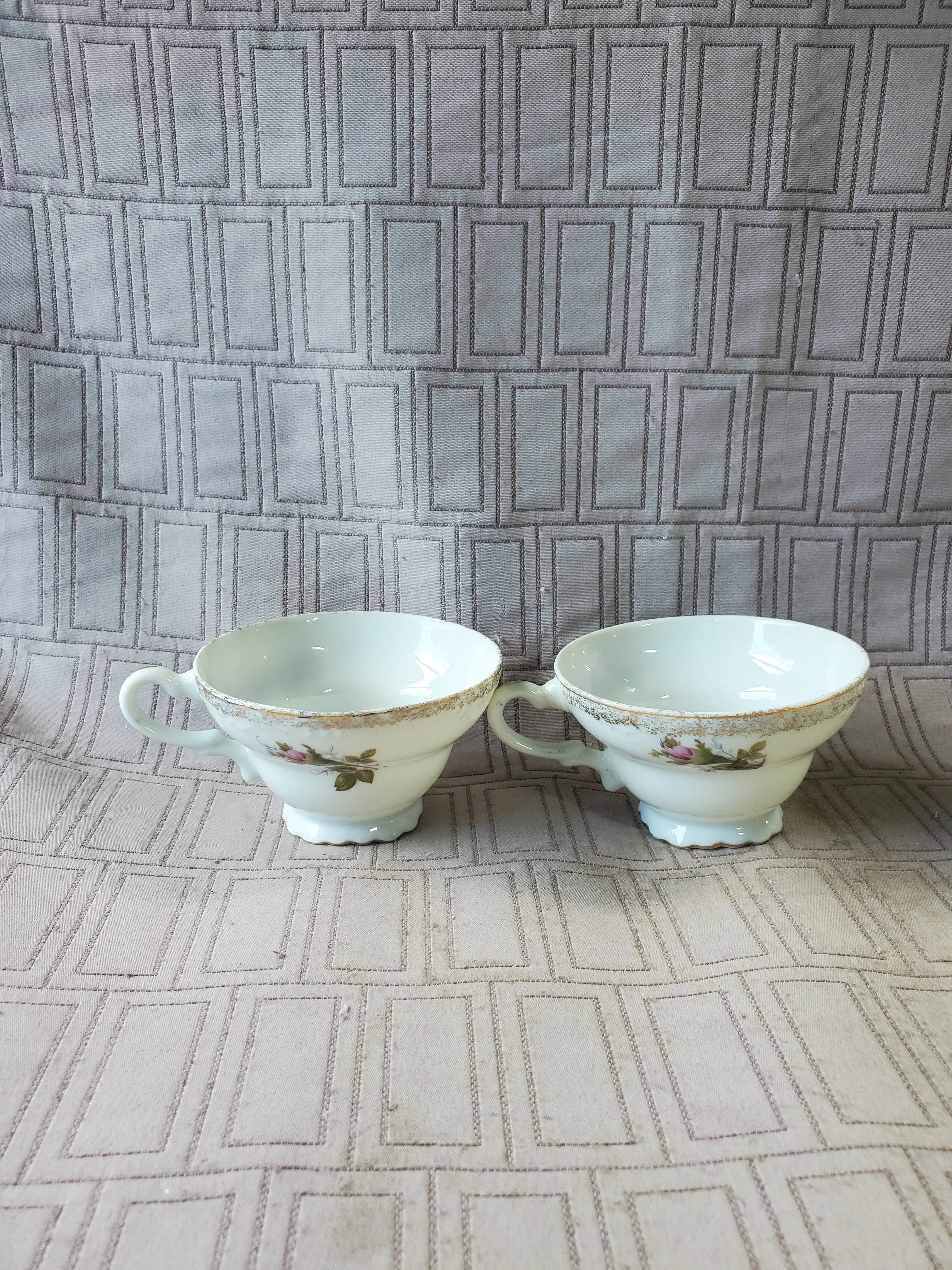 Pair of White and Pink Floral Teacup and Saucer Sets