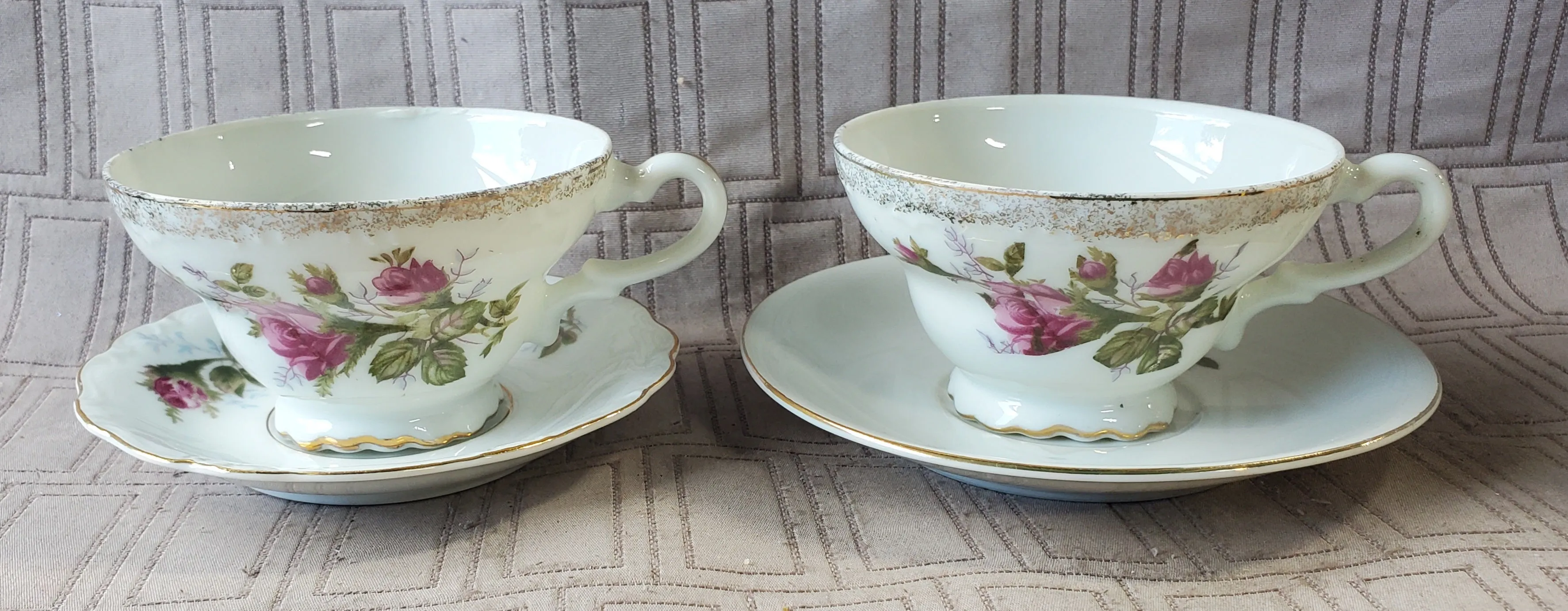 Pair of White and Pink Floral Teacup and Saucer Sets