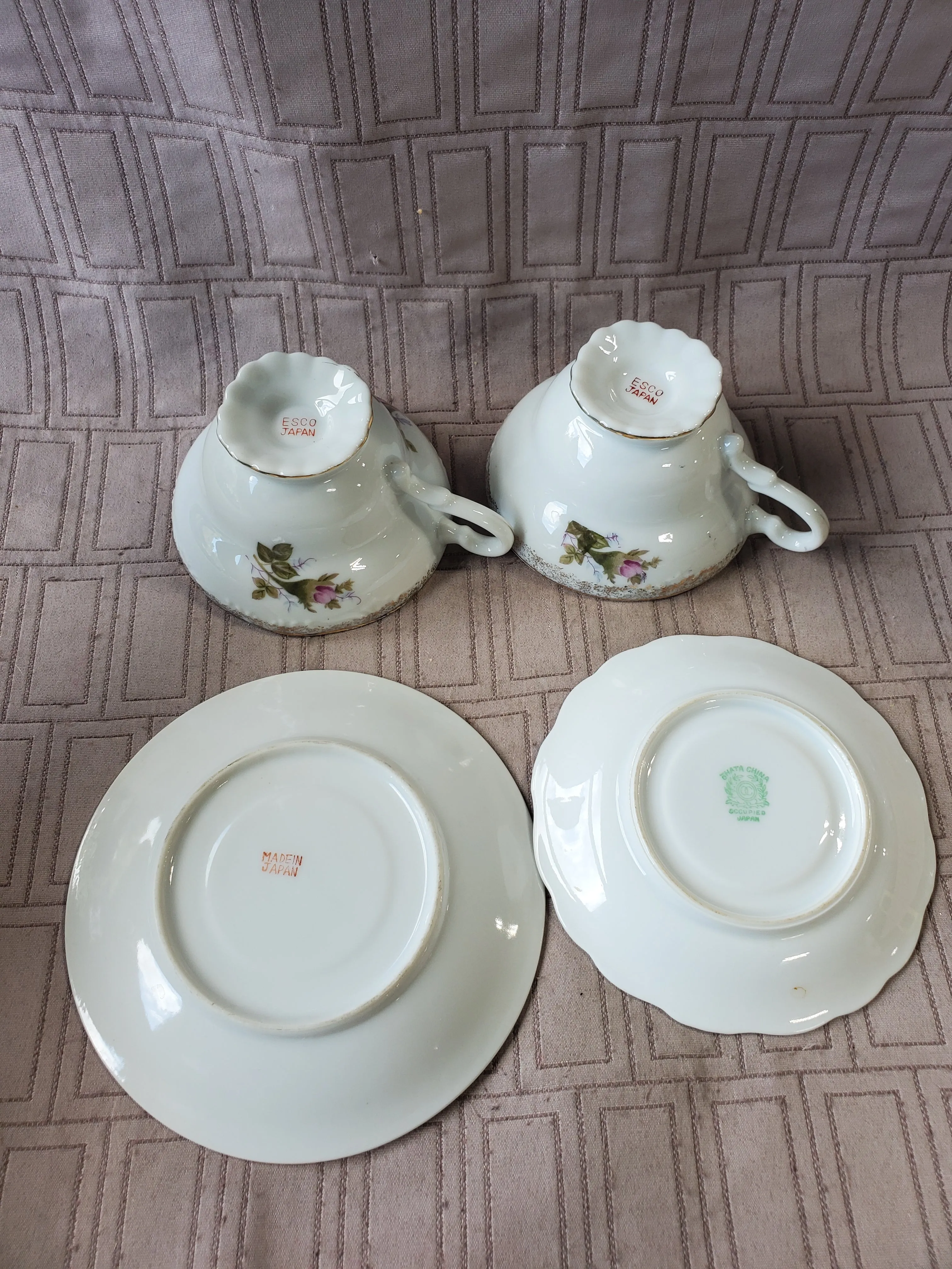 Pair of White and Pink Floral Teacup and Saucer Sets